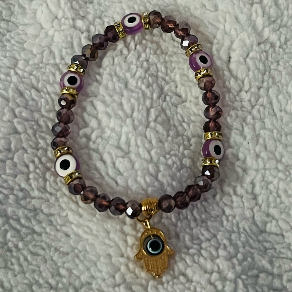 Stretchy 🧿 evil eye protection bracelet with hamsa charm
